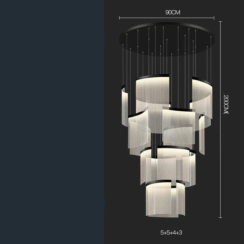 Large gold mesh disc chandelier with multiple pendant heads against a light ceiling