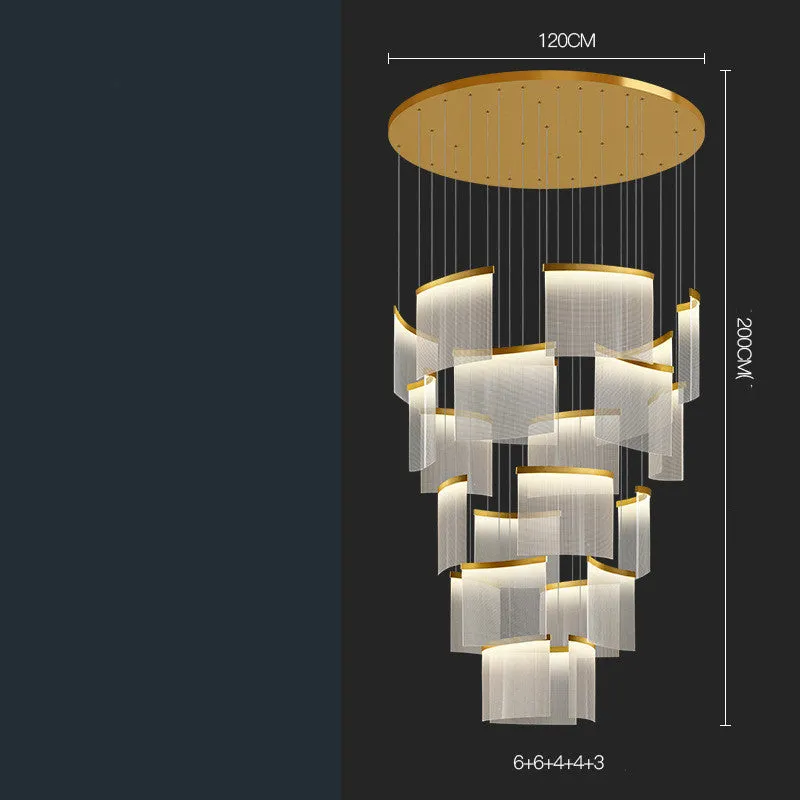 Large gold mesh disc chandelier with multiple pendant heads against a light ceiling