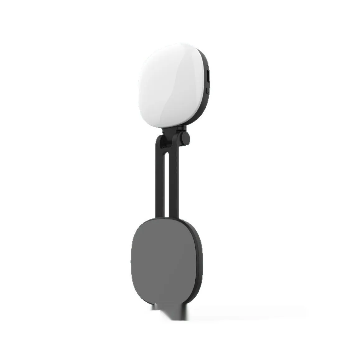 Black and white mini portable fill light with magnetic phone holder showing three colour temperature settings