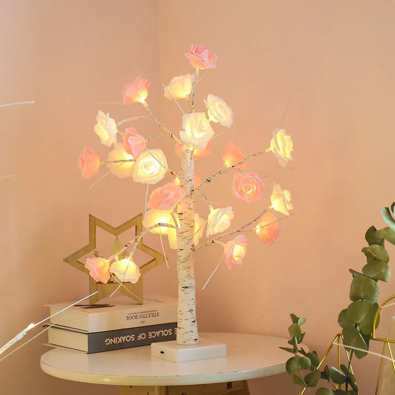 60cm Christmas rose shining tree lamp with pink and white flower-shaped PVC lights on a tabletop
