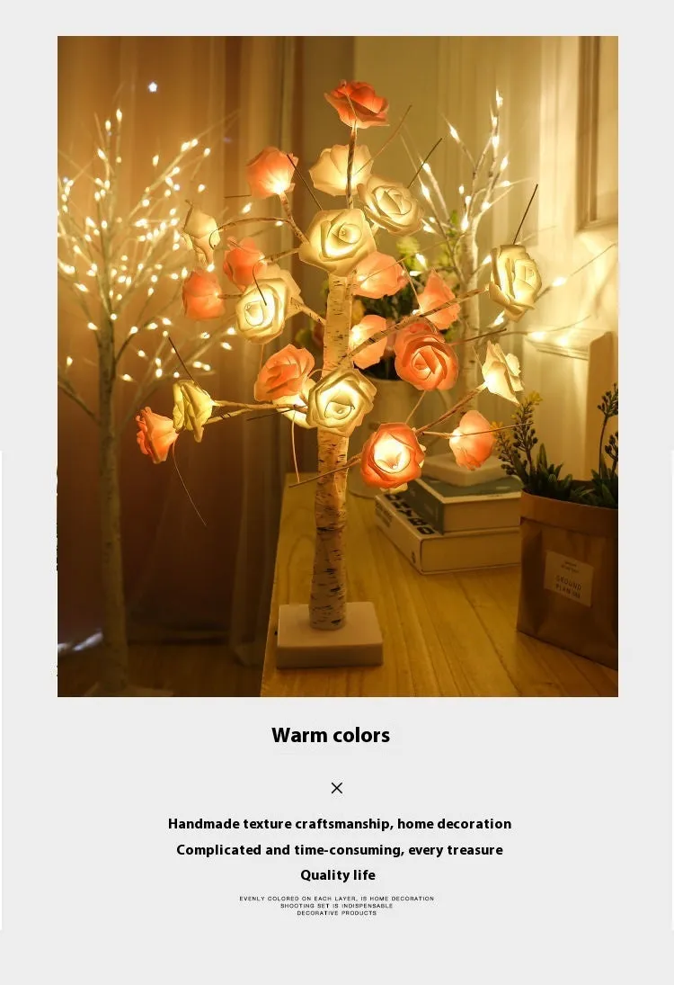 60cm Christmas rose shining tree lamp with pink and white flower-shaped PVC lights on a tabletop