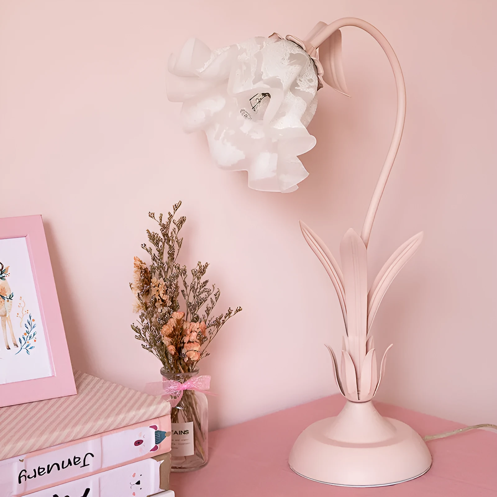 Pink princess room desk lamp with ceramic flowers, glass lampshade, and dimmer switch on a wooden desk