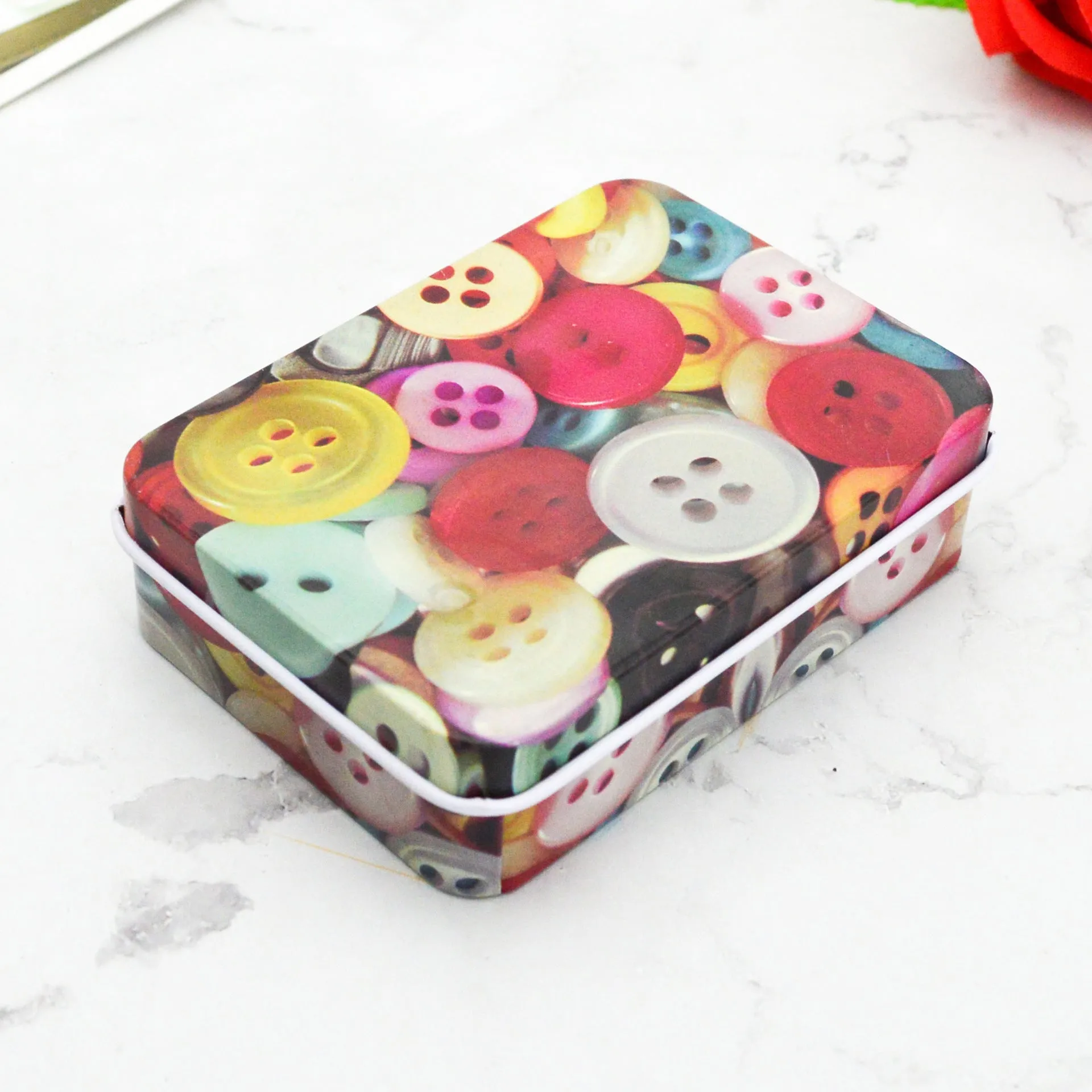 Square tinplate storage box with dimensions 90x65x25mm, available in multiple colours for jewellery and stickers