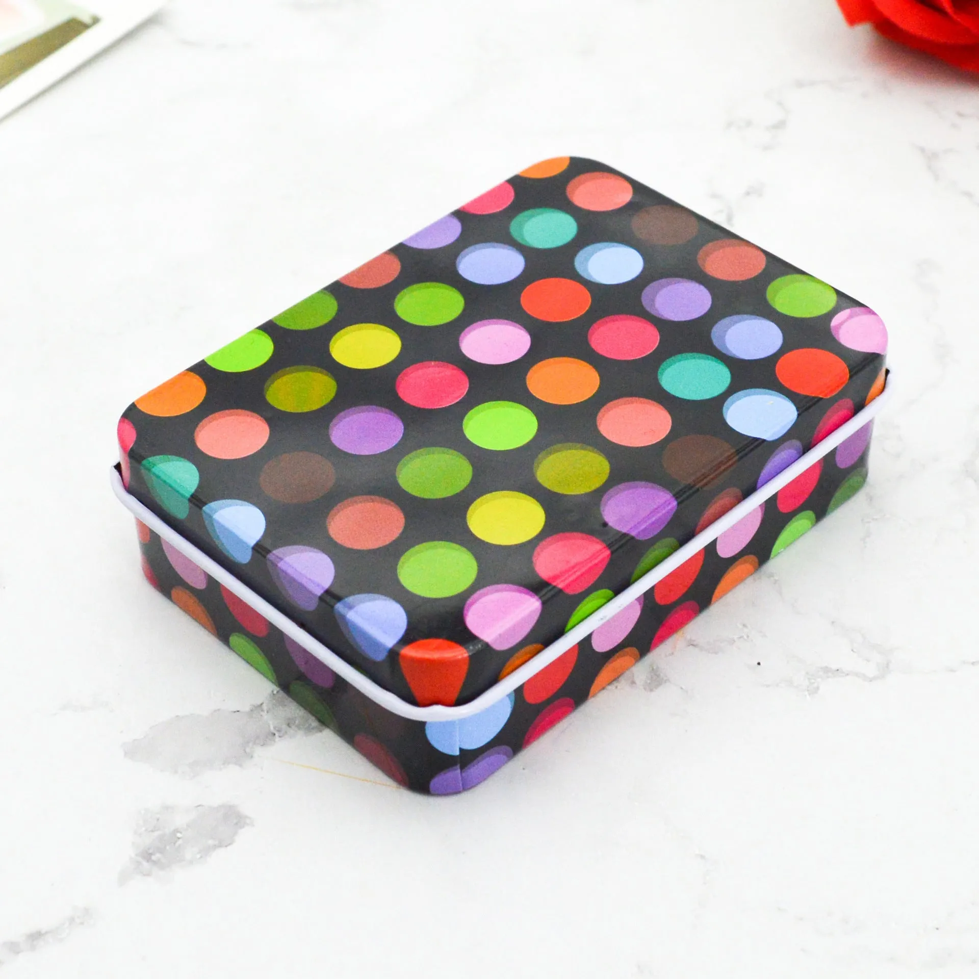 Square tinplate storage box with dimensions 90x65x25mm, available in multiple colours for jewellery and stickers