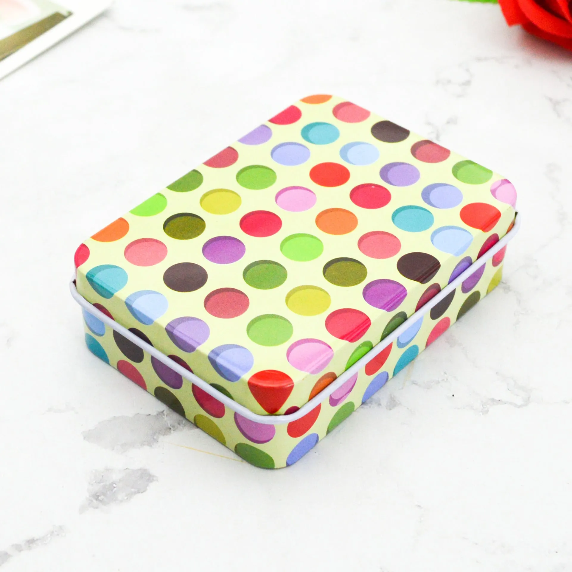 Square tinplate storage box with dimensions 90x65x25mm, available in multiple colours for jewellery and stickers