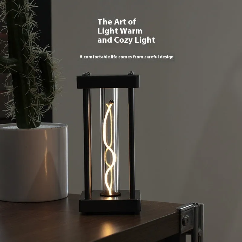 Metallic gray USB rechargeable night light with curved wire, 68x68x159mm