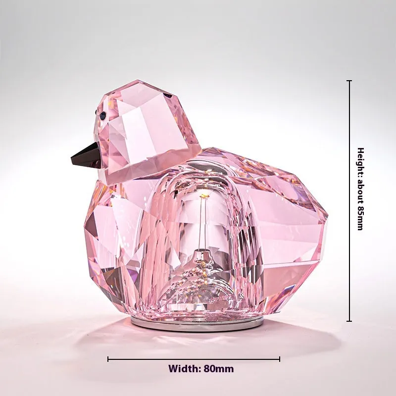 Portable crystal table lamp with 3-level dimming, compact 85x80mm size, available in purple, pink, and transparent colours