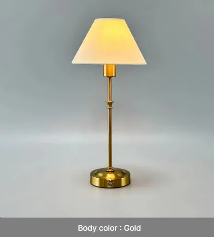 Gold alloy desk lamp with LED light source and three-step dimming button