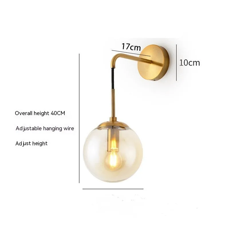Nordic glass wall lamp with amber glass shade, black metal body, mounted on wall