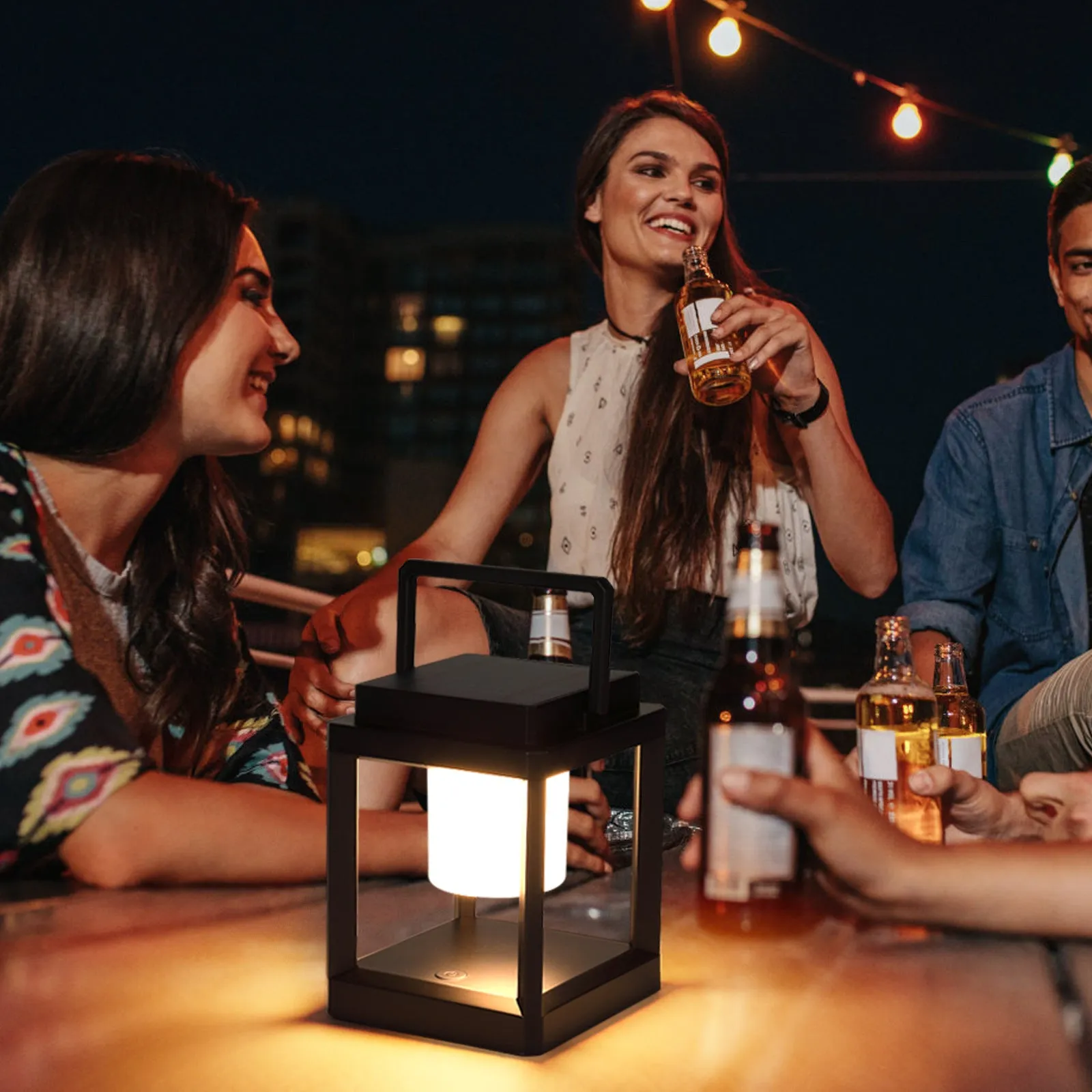 Outdoor USB handheld multifunctional charging ambient light lantern with black cover and white shell
