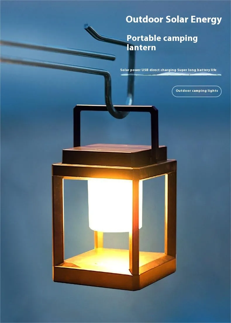 Outdoor USB handheld multifunctional charging ambient light lantern with black cover and white shell