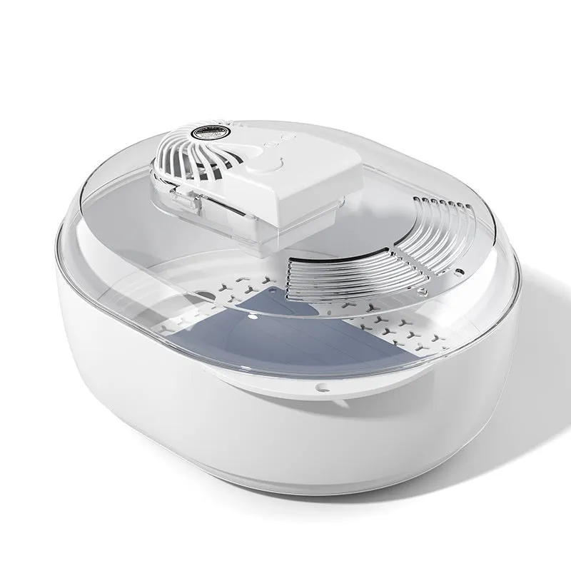 Aluminium household quick defrosting plate and separate USB cable on a kitchen counter.