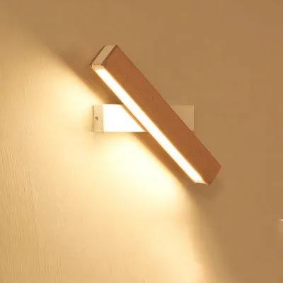 Modern wooden LED wall lamp with adjustable light bar in black finish illuminating room