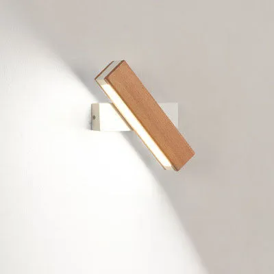 Modern wooden LED wall lamp with adjustable light bar in black finish illuminating room