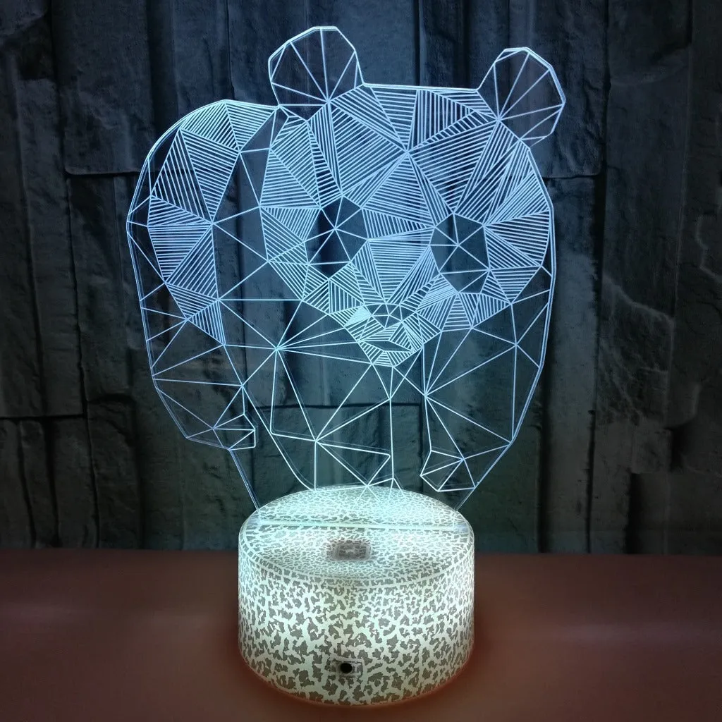 Panda colorful LED 3D night light with remote control showing seven colour gradient on a bedroom shelf