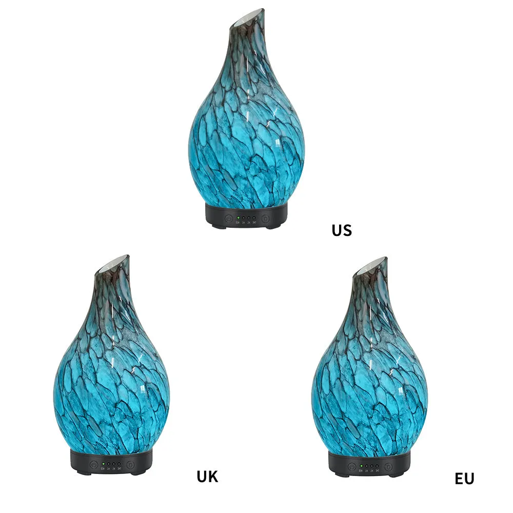 Blue cobblestone-style aroma diffuser with single fog outlet, mechanical controls, and blue finish for home use