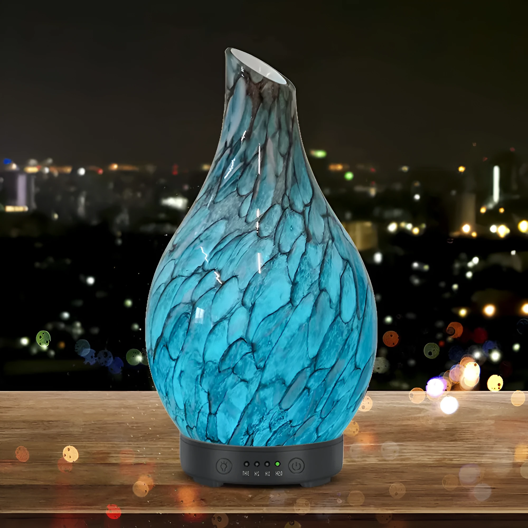 Blue cobblestone-style aroma diffuser with single fog outlet, mechanical controls, and blue finish for home use