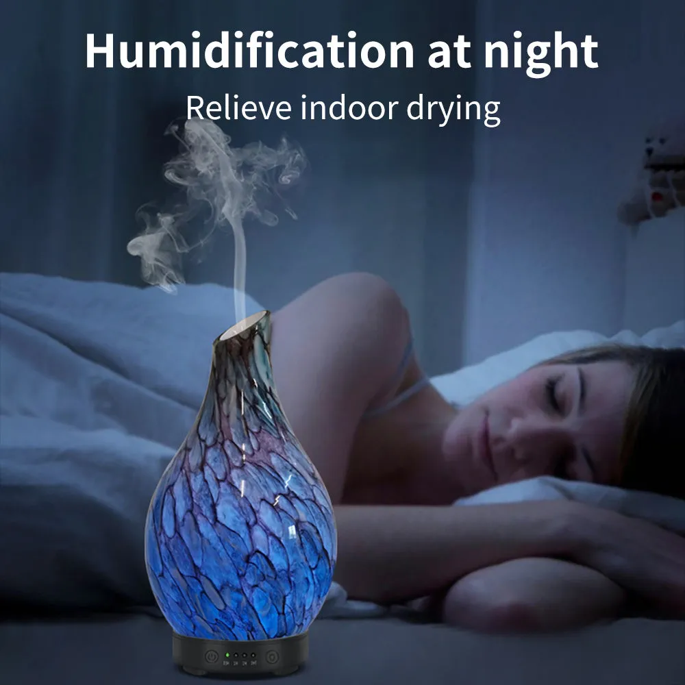 Blue cobblestone-style aroma diffuser with single fog outlet, mechanical controls, and blue finish for home use