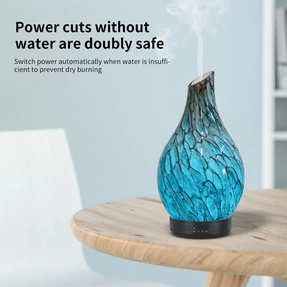 Blue cobblestone-style aroma diffuser with single fog outlet, mechanical controls, and blue finish for home use