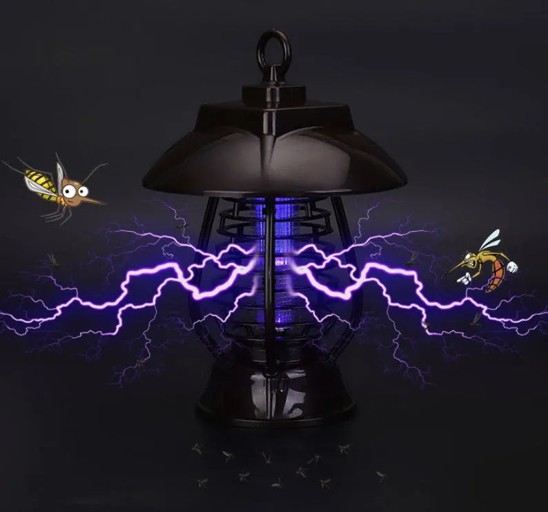 White and black solar-powered outdoor mosquito lamp with solar panel on top and LED light body.