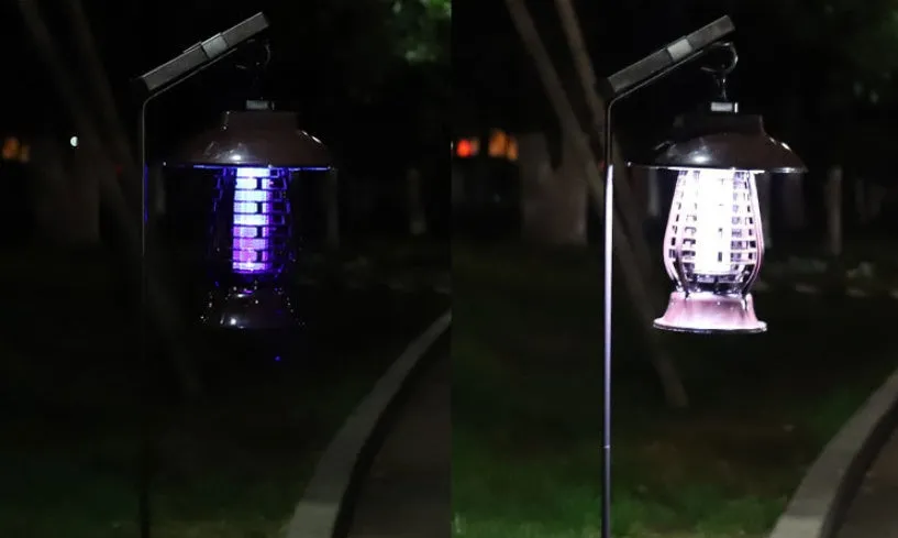 White and black solar-powered outdoor mosquito lamp with solar panel on top and LED light body.