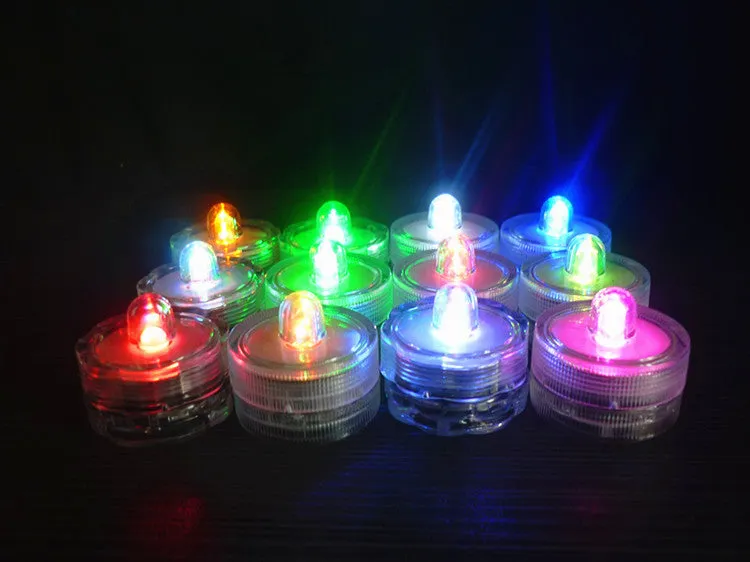Set of 12 miniature LED waterproof candle lights in 7 colours with round and plum shapes