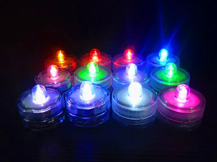 Set of 12 miniature LED waterproof candle lights in 7 colours with round and plum shapes