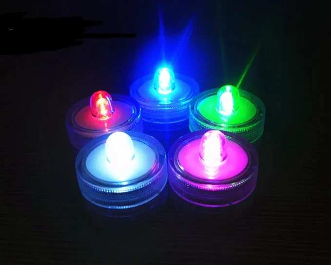 Set of 12 miniature LED waterproof candle lights in 7 colours with round and plum shapes