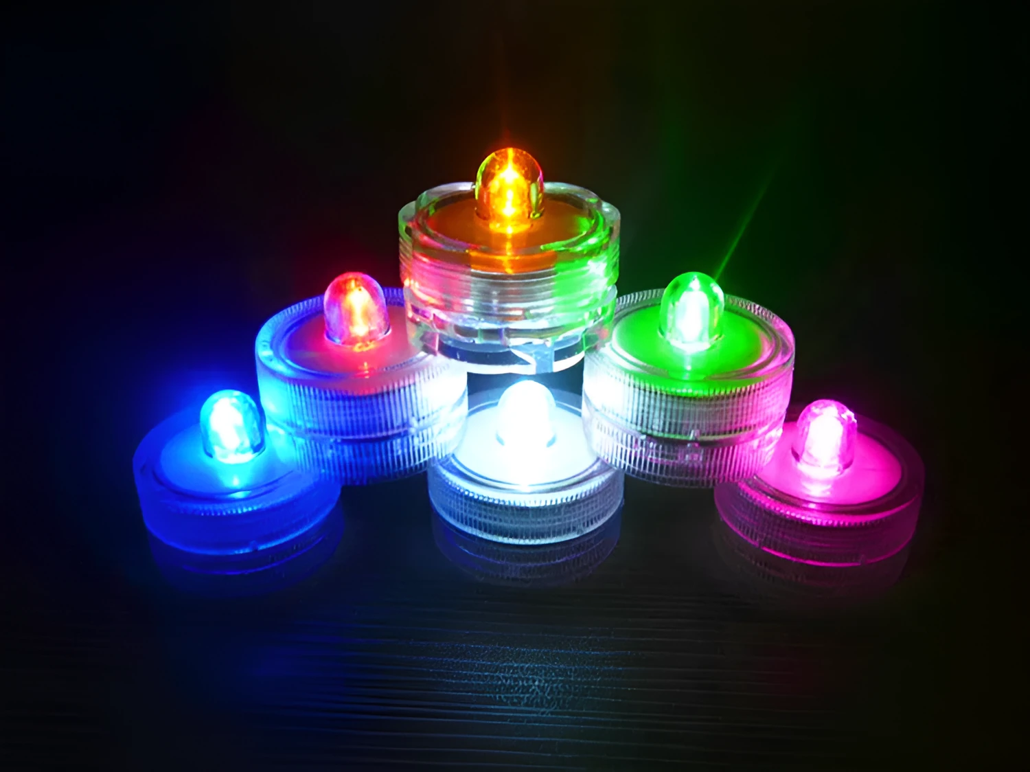 Set of 12 miniature LED waterproof candle lights in 7 colours with round and plum shapes