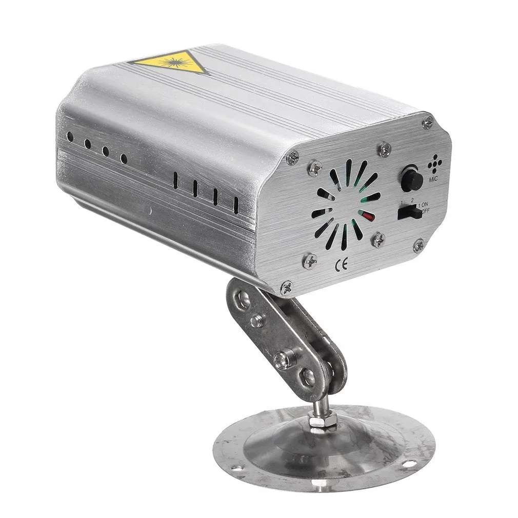 JC-24 dual laser light emitting red and green patterns against a dark indoor background with voice control remote included