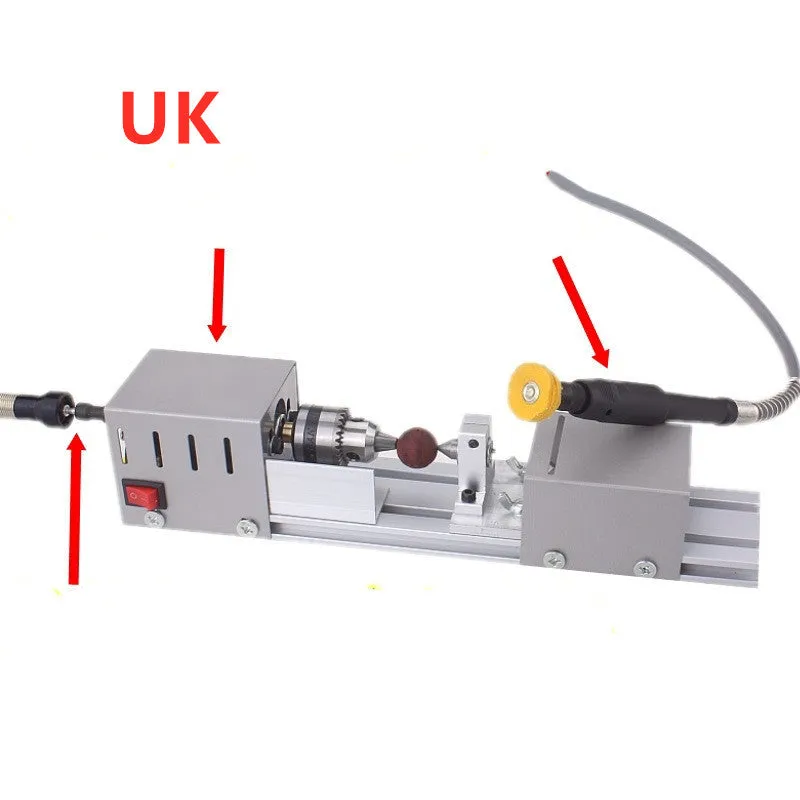 Compact silver metal mini woodworking lathe with tools for manual wood turning, showing scale.