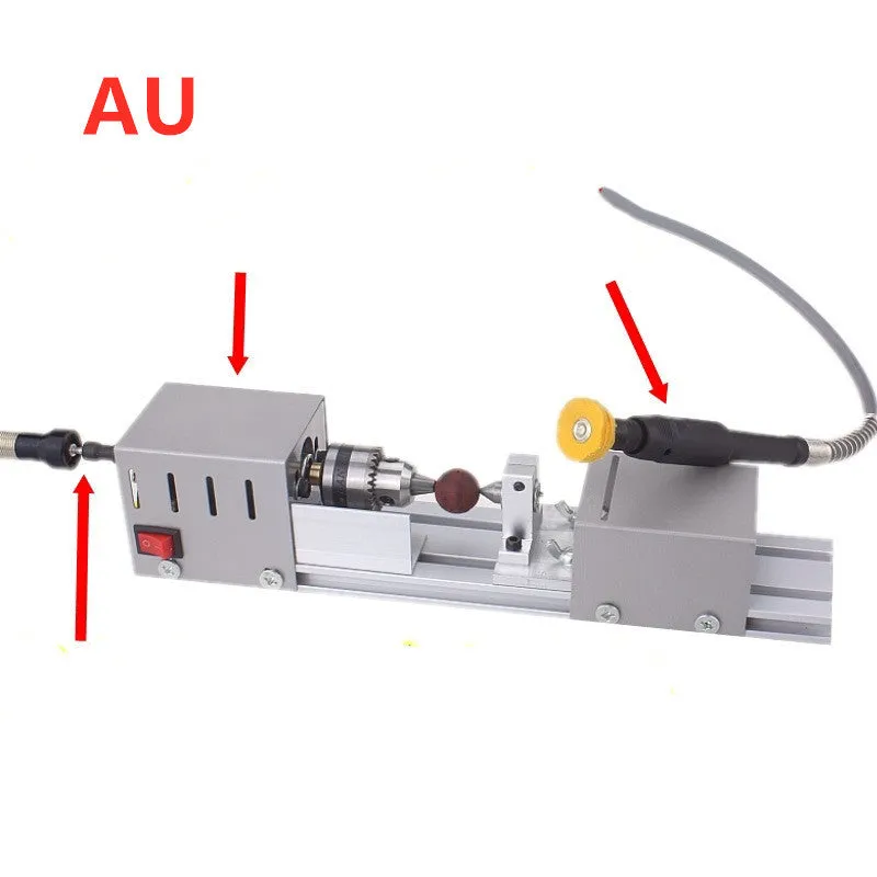 Compact silver metal mini woodworking lathe with tools for manual wood turning, showing scale.