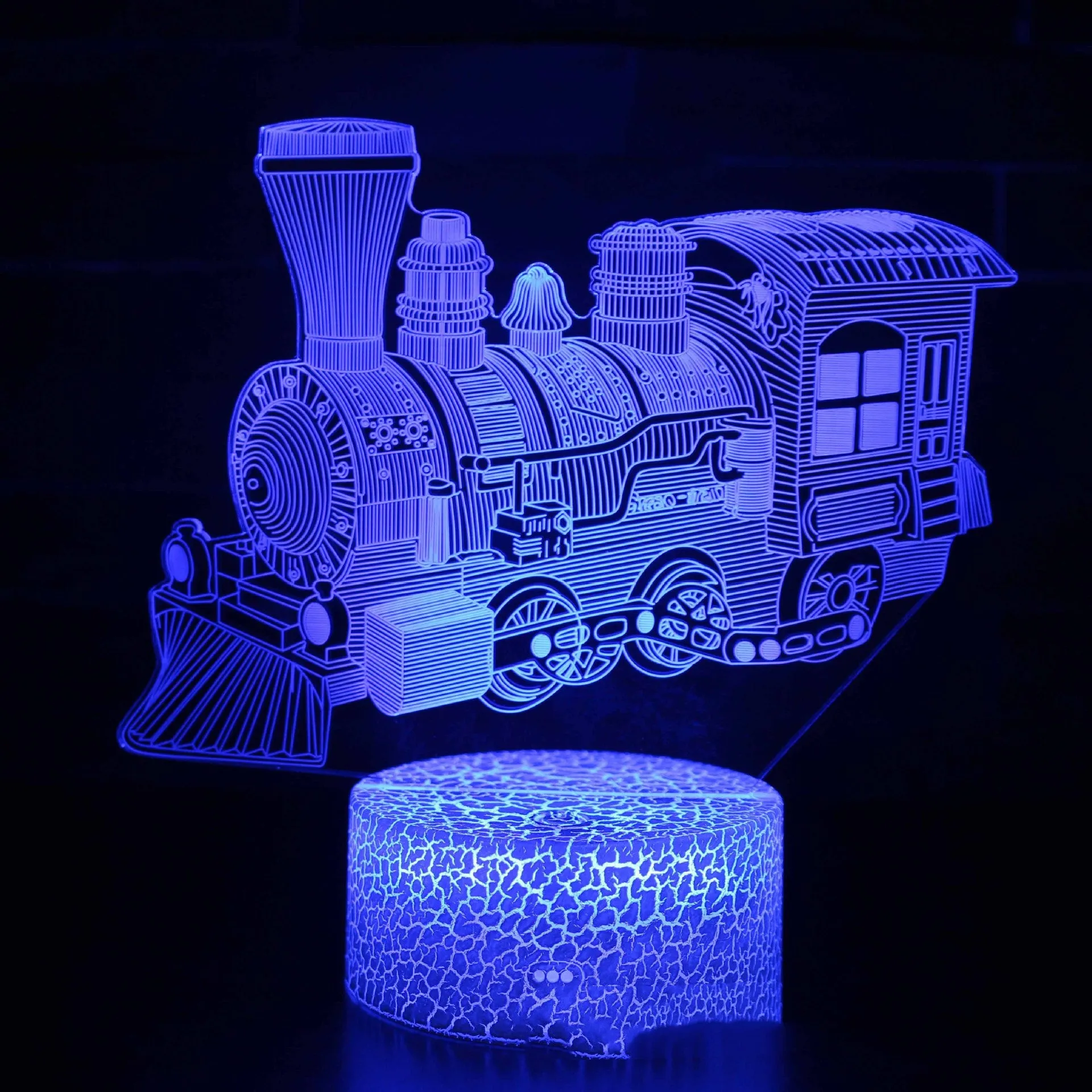 3D table lamp showing train design with black base, acrylic shade, and colourful LED glow
