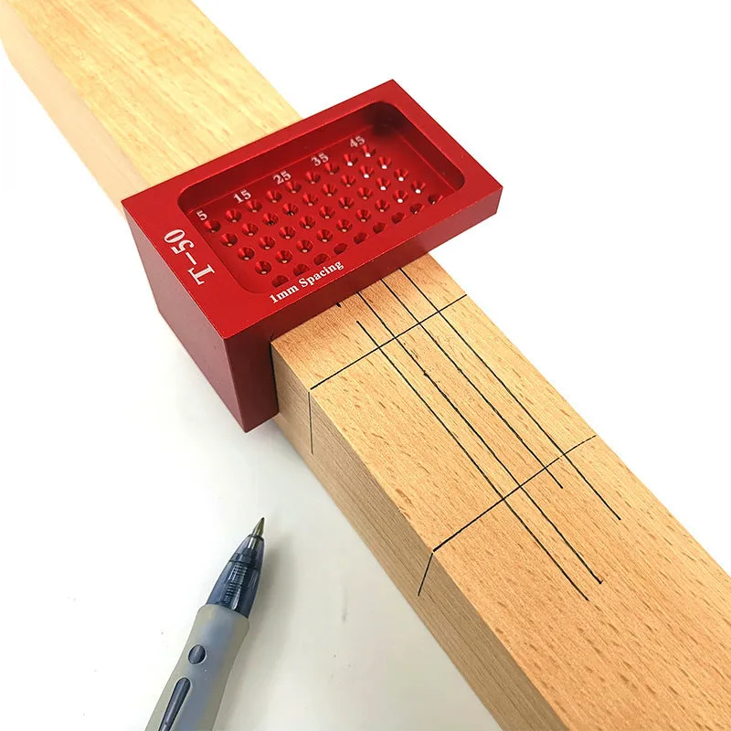 Red alloy steel T50 Mini Scribe woodworking ruler on a workbench for household marking