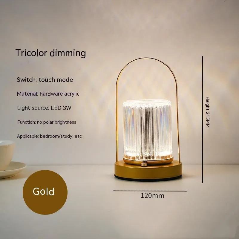 Portable black metal and acrylic LED table lamp with touch dimmer, USB rechargeable, 3W, on a camping table