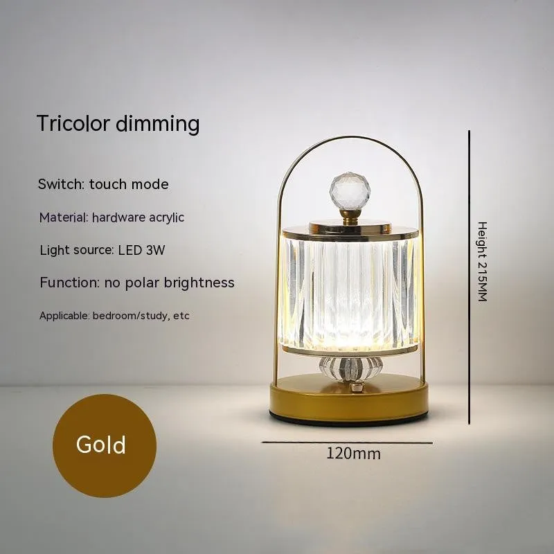Portable black metal and acrylic LED table lamp with touch dimmer, USB rechargeable, 3W, on a camping table