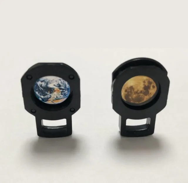 2 in 1 Earth and Moon star projector lamp with adjustable hose bracket on a table