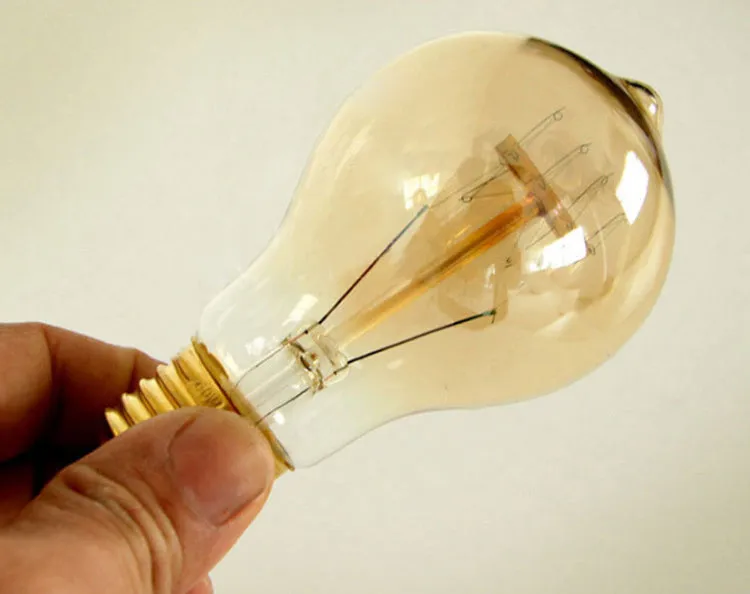 40W E27 retro bulb with milky beak shape emitting warm white light for bar cafe use