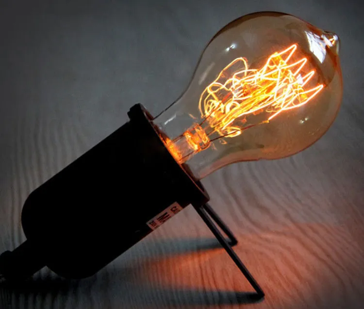 40W E27 retro bulb with milky beak shape emitting warm white light for bar cafe use