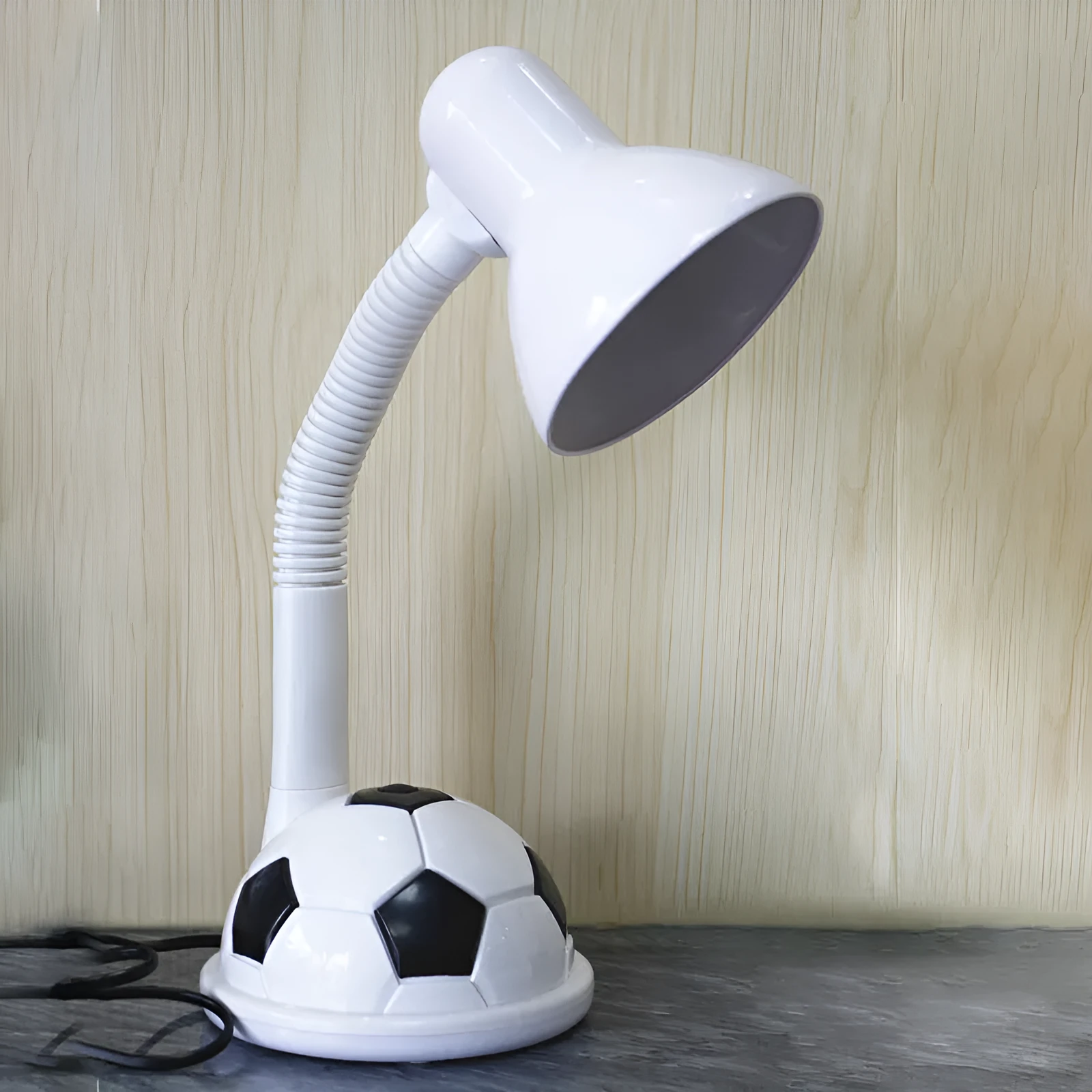White ABS student desk lamp with flex neck and rectangular base on flat surface