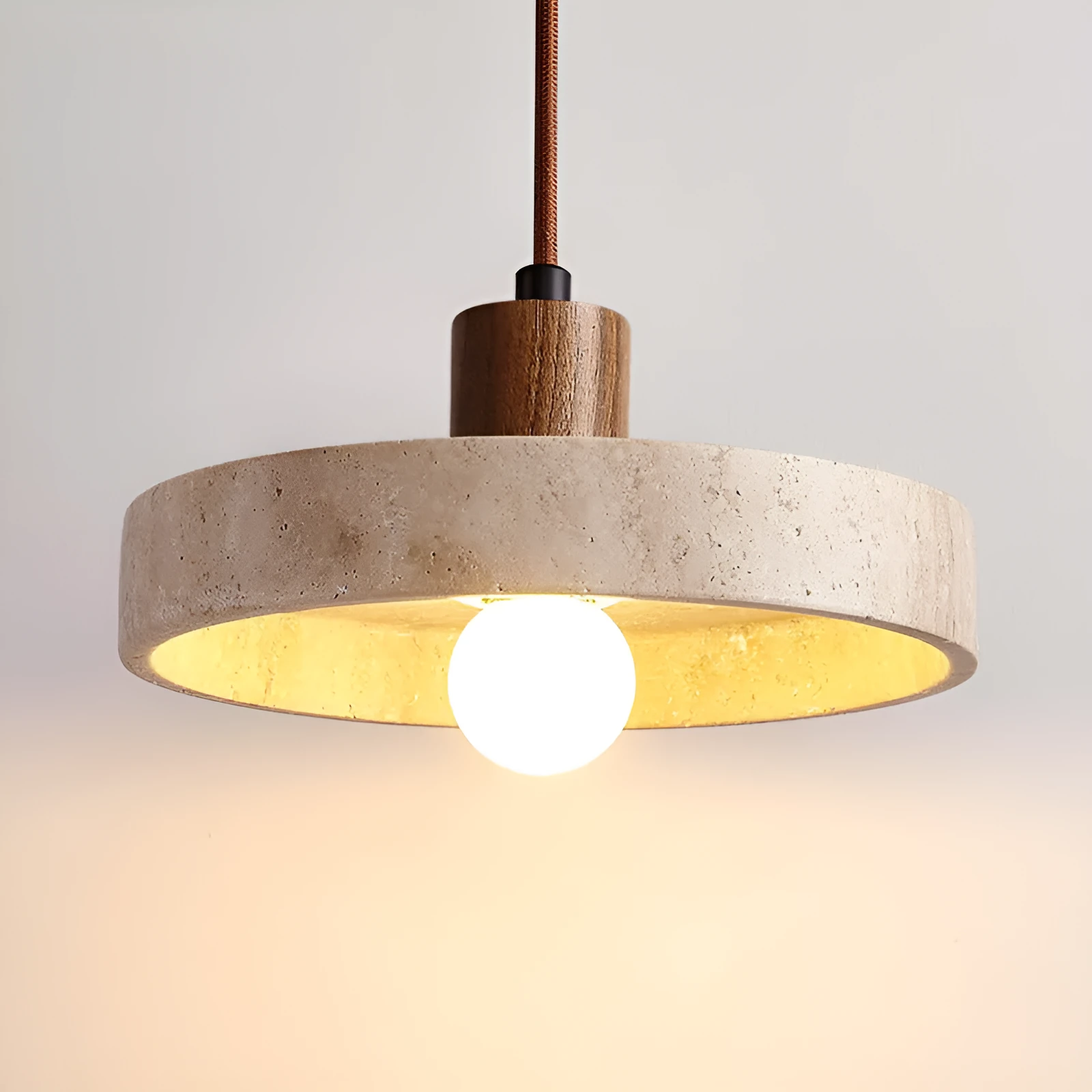 Small yellow cave stone and solid wood pendant light on a bedside table, 21 cm diameter, wood colour option