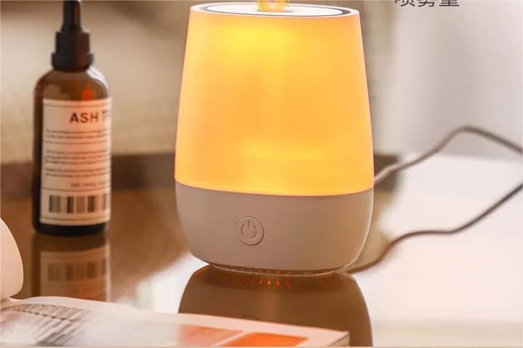 White USB aromatherapy humidifier with simulated flame effect showing 125ml water tank capacity