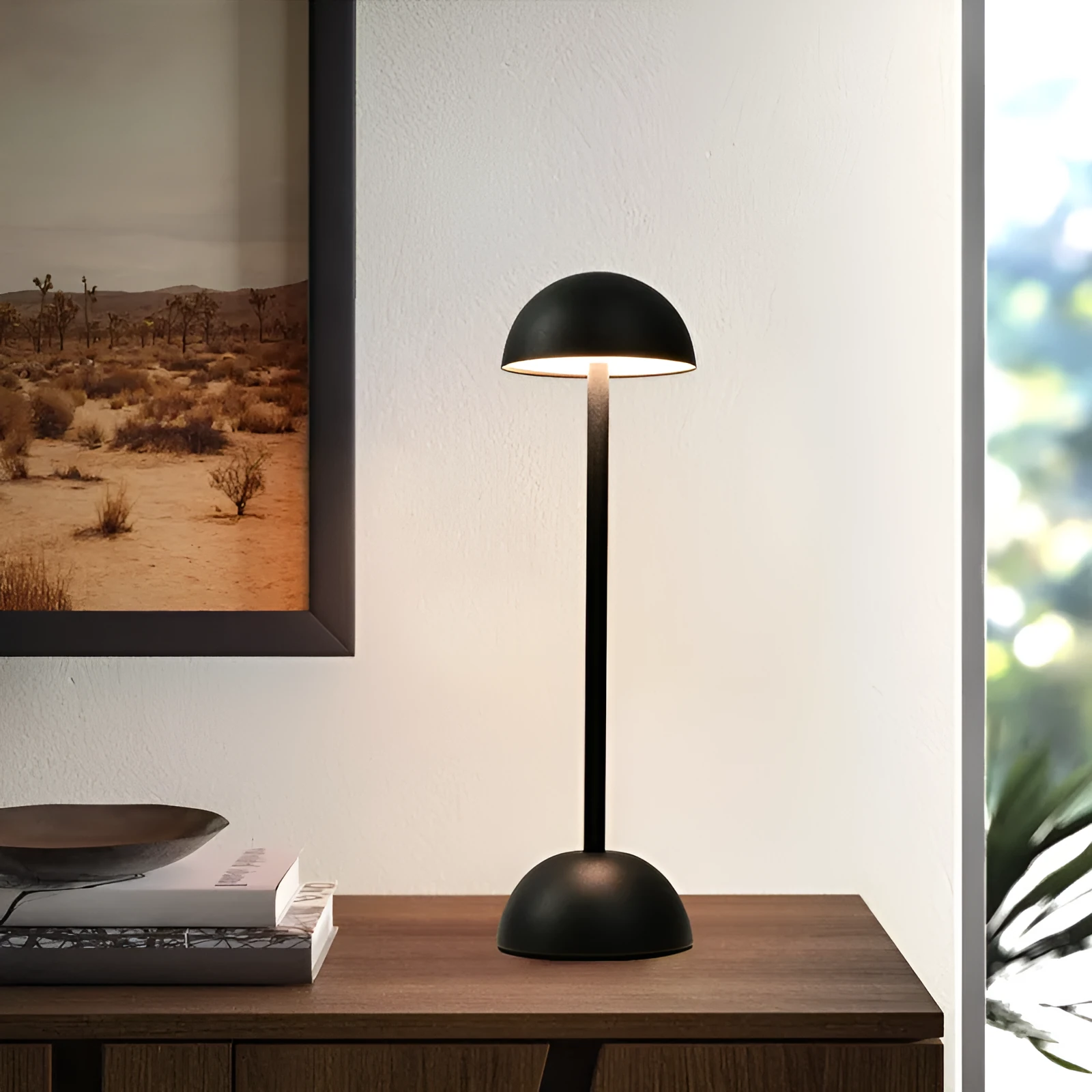 Metal mushroom table lamp in high foot design with white finish on a bar table