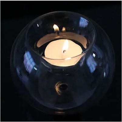Handmade round hollow glass candle holder with clear glass construction