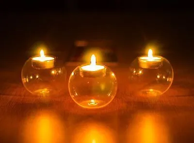 Handmade round hollow glass candle holder with clear glass construction