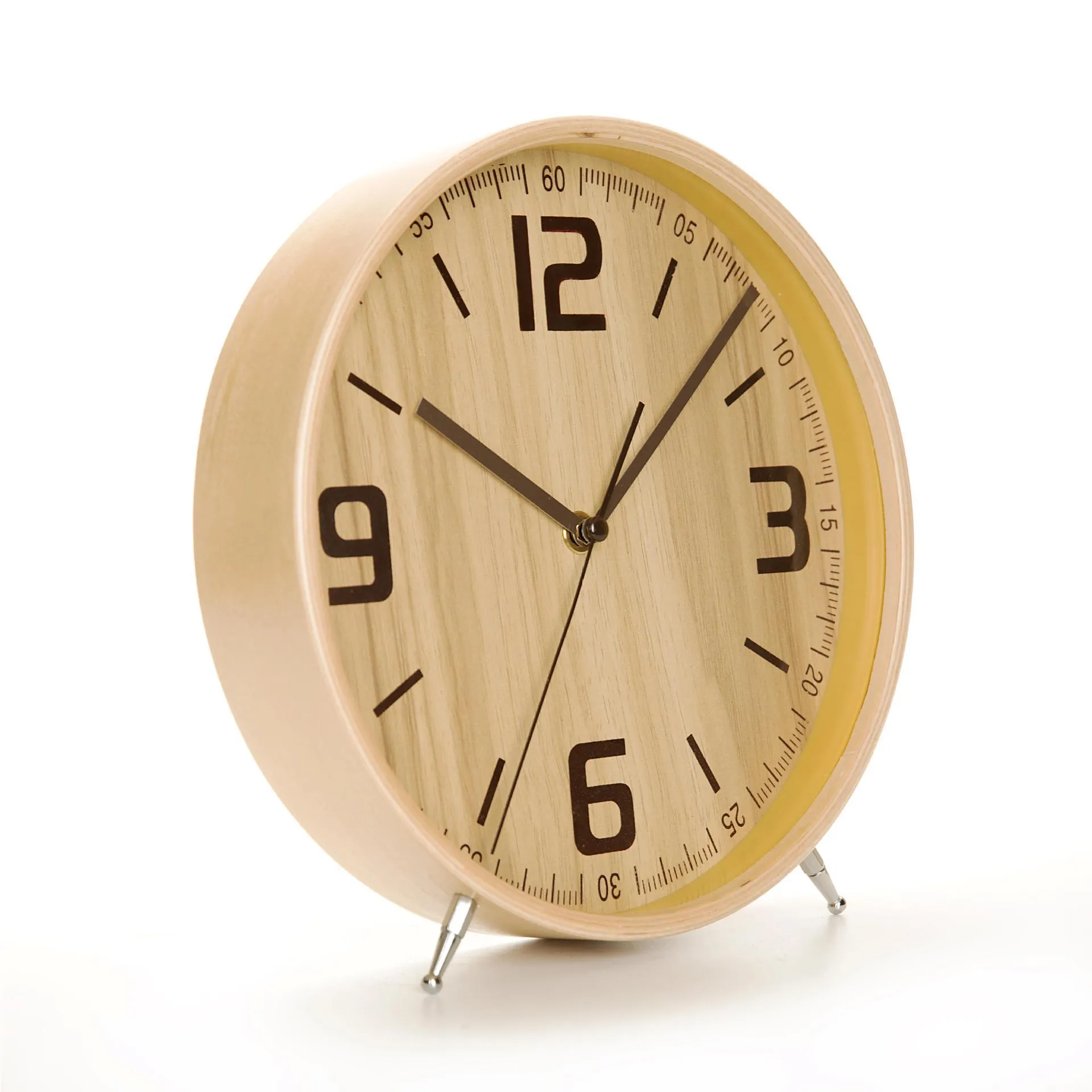 Round wood quartz table clock with sweep second movement in green finish on a wooden surface