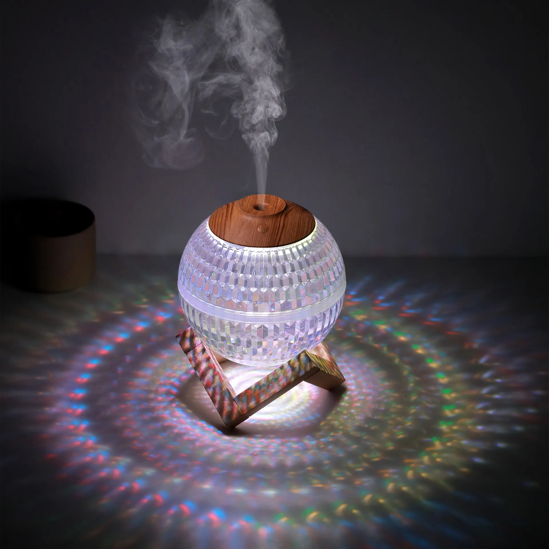 Crystal ball humidifier round 116 mm USB with atmosphere sea light on a desk