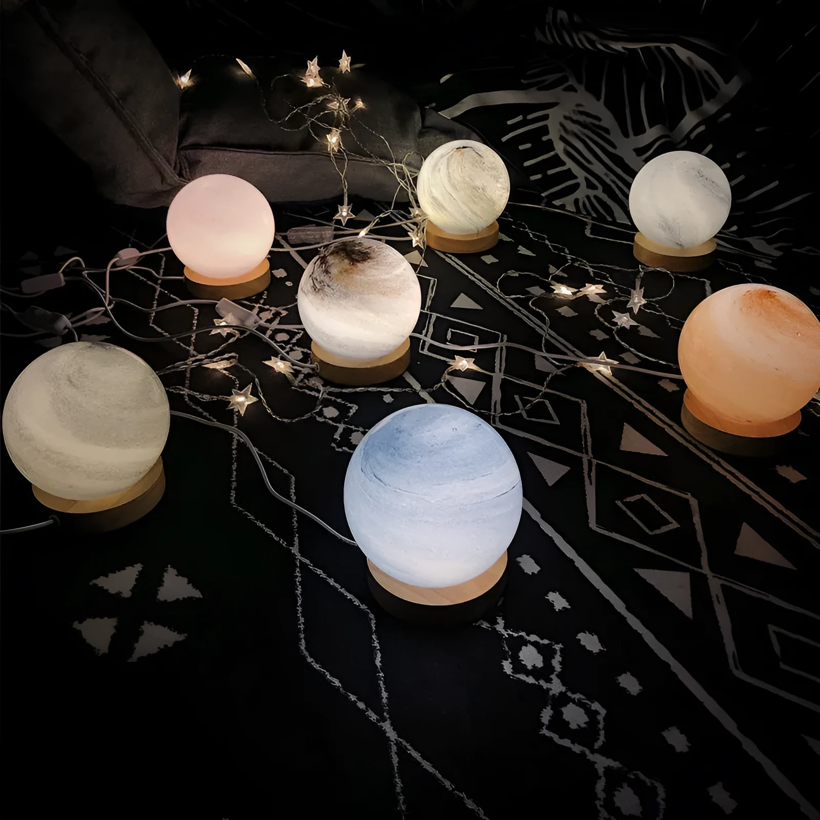 Nordic style Planet Light table lamp with transparent glass shade, shown in emerald green colour.