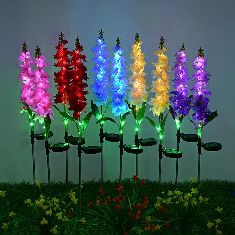 Solar LED violet lawn light with ABS housing and stainless steel pole for outdoor garden use