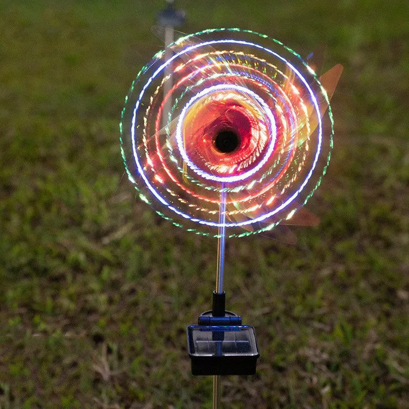 Solar wind spinner light with LED and IP65 rating, featuring spinning windmill decoration for garden paths in four colour options
